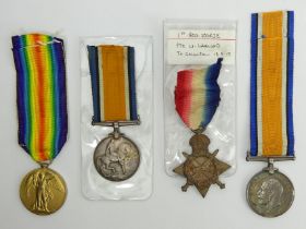 Four World War I medals, one pair and two singles. UK Postage £12.