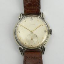 Zenith manual wind gents watch on a brown leather strap, 34mm inc. crown. UK Postage £12.