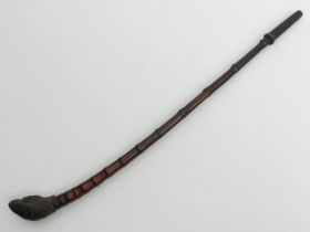 19th century bamboo opium pipe from Southeast Asia with brass mounts, 42cm. UK Postage £12.
