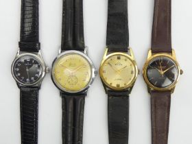 Four gents manual wind watches, Zenith, Buler, Exacto, and Bravingtons, 32mm-40mm inc. crowns. UK