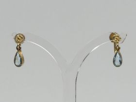 A pair of 9ct gold blue paste earrings, 1.7 grams, 15mm long. UK Postage £12.
