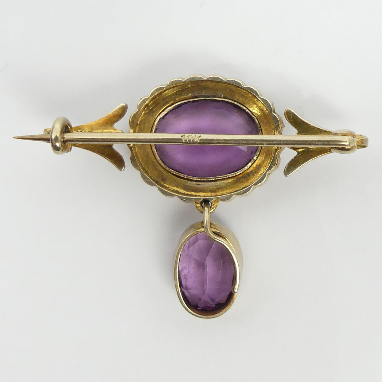 10ct gold amethyst and seed pearl brooch, 5.1 grams, 25mm x 26mm. UK Postage £12. - Image 2 of 2