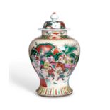 A LARGE 19TH CENTURY CHINESE CRACKLE GLAZED FAMILLE VERTE JAR AND COVER