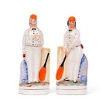 A PAIR OF MID 19TH CENTURY STAFFORDSHIRE FIGURES OF CRICKETERS