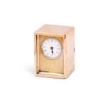 ASPREY: A 9CT GOLD MINIATURE TRAVELLING CLOCK