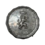 A 19TH CENTURY PEWTER DISH WITH LION RAMPANT