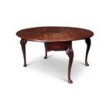 AN 18TH CENTURY IRISH MAHOGANY DROP LEAF DINING TABLE