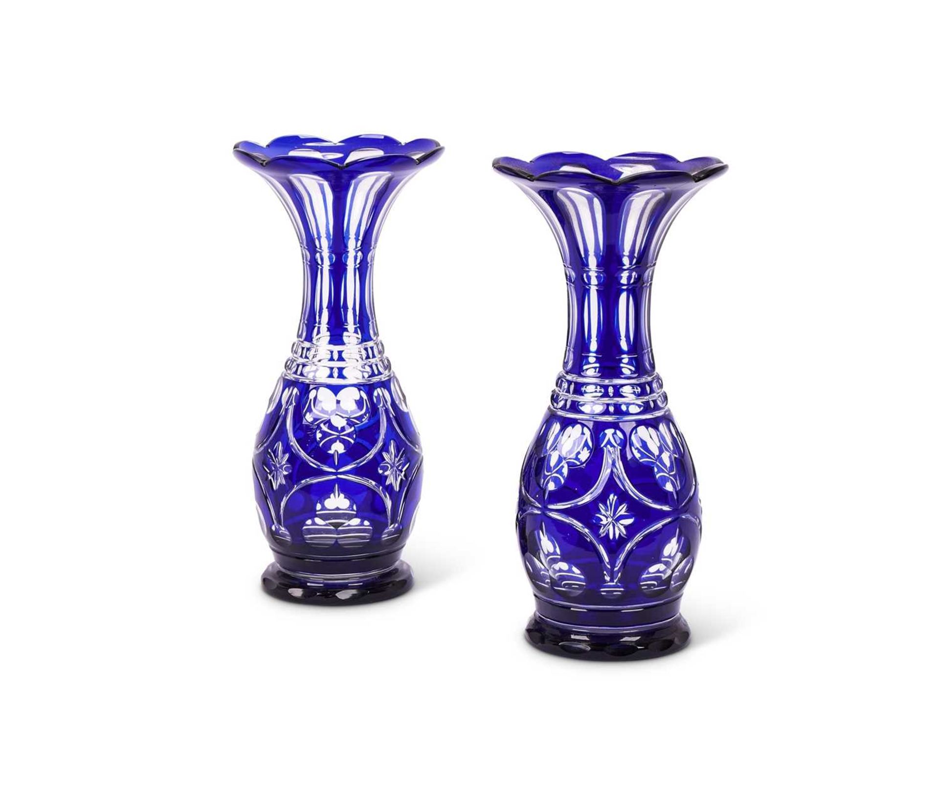 A PAIR OF LATE 19TH CENTURY BOHEMIAN OVERLAY BLUE GLASS VASES