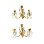 BACCARAT: A PAIR OF LATE 19TH / EARLY 20TH CENTURY GILT BRONZE AND CRYSTAL WALL LIGHTS