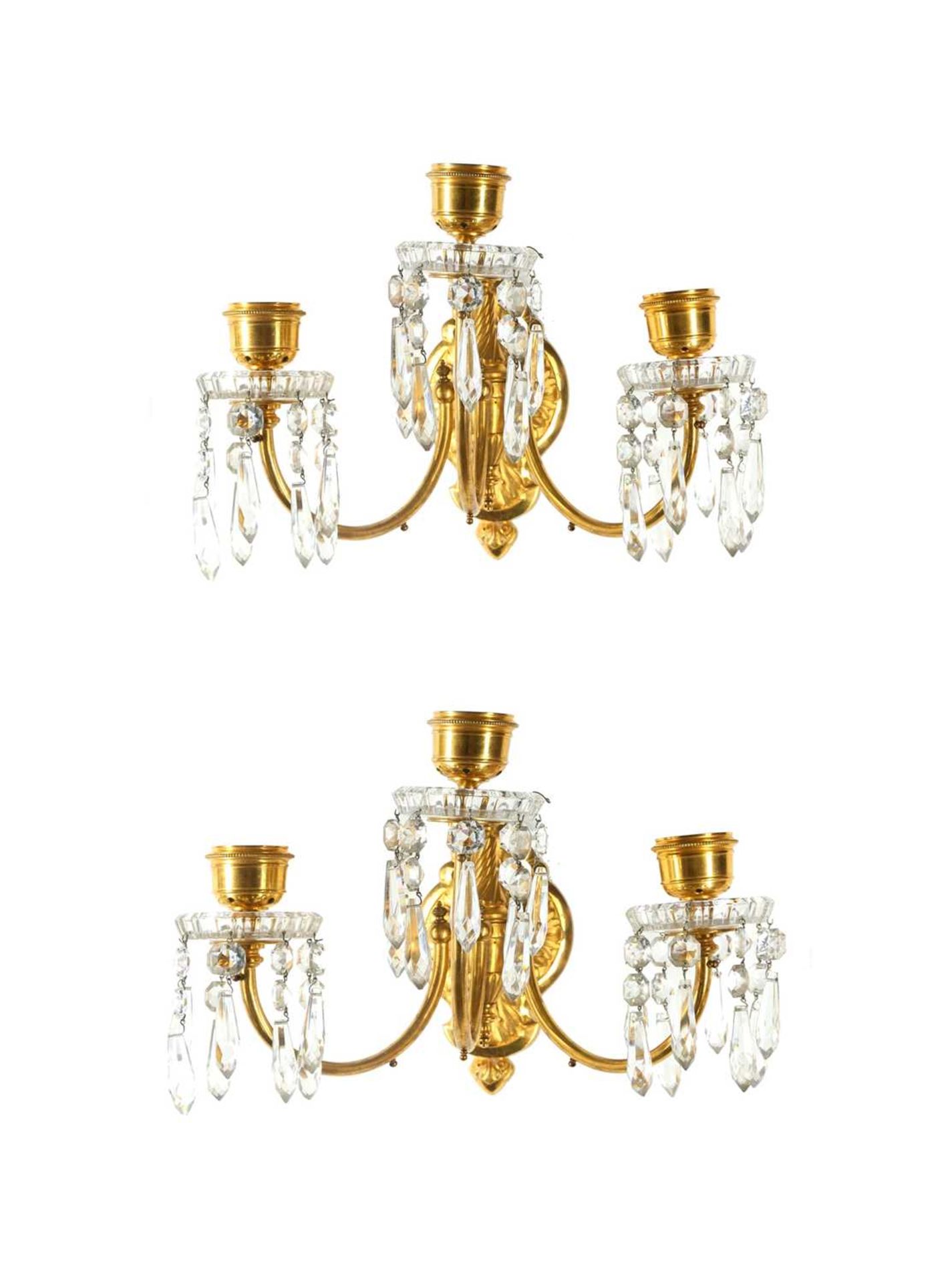 BACCARAT: A PAIR OF LATE 19TH / EARLY 20TH CENTURY GILT BRONZE AND CRYSTAL WALL LIGHTS