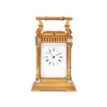 A LATE 19TH CENTURY FRENCH GILT BRASS STRIKING CARRIAGE CLOCK WITH REPEAT
