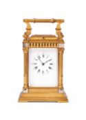 A LATE 19TH CENTURY FRENCH GILT BRASS STRIKING CARRIAGE CLOCK WITH REPEAT