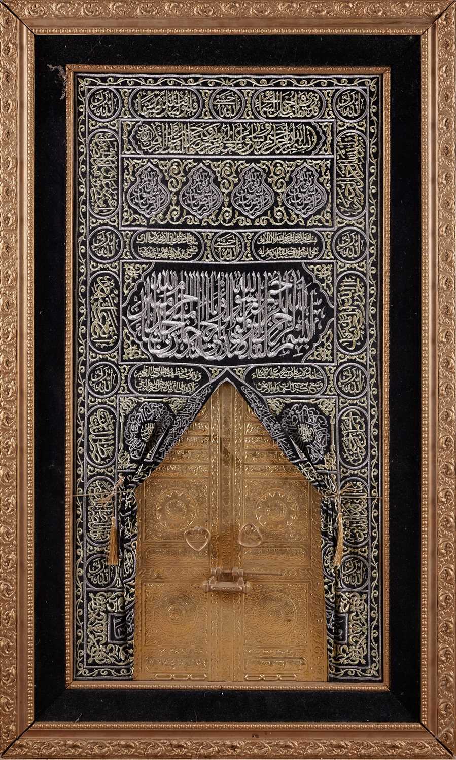 AN ISLAMIC SILVER AND GOLD THREAD PANEL DEPICTING THE DOOR OF KHANA KAABA, MAKKAH