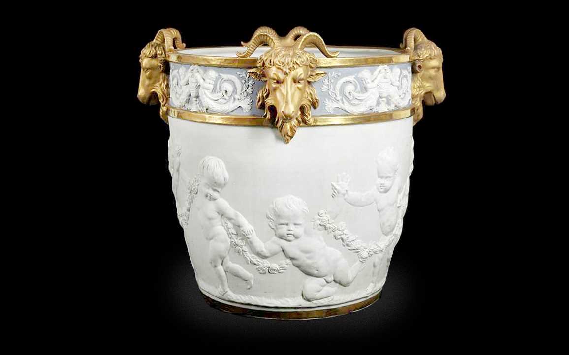 A LARGE 19TH CENTURY NEO-CLASSICAL STYLE BISQUE PORCELAIN AND PARCEL GILT JARDINIERE