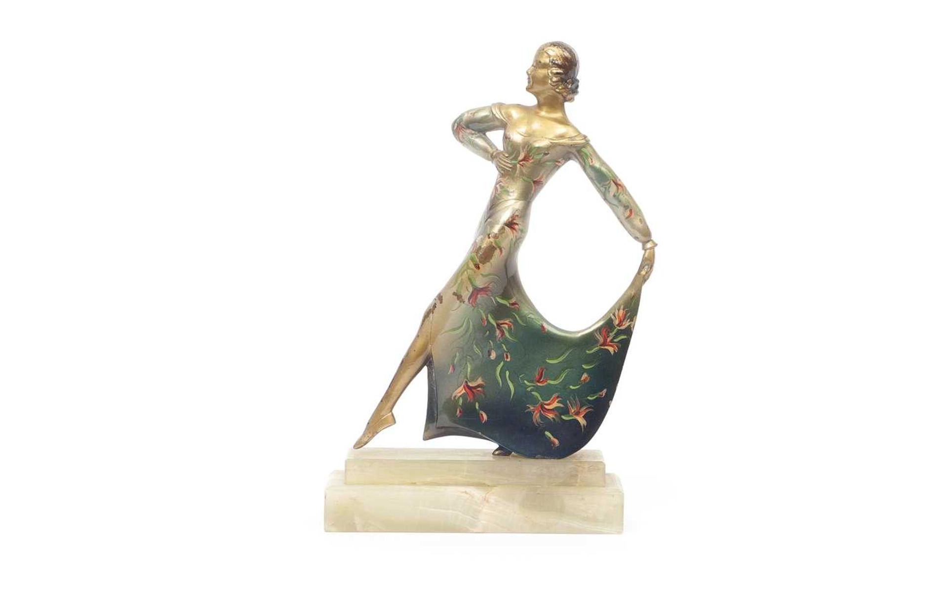 AN ART DECO PERIOD COLD PAINTED BRONZE AND ONYX FIGURE OF A DANCING GIRL