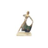 AN ART DECO PERIOD COLD PAINTED BRONZE AND ONYX FIGURE OF A DANCING GIRL