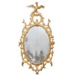 A GEORGE III CHIPPENDALE STYLE GILTWOOD MIRROR