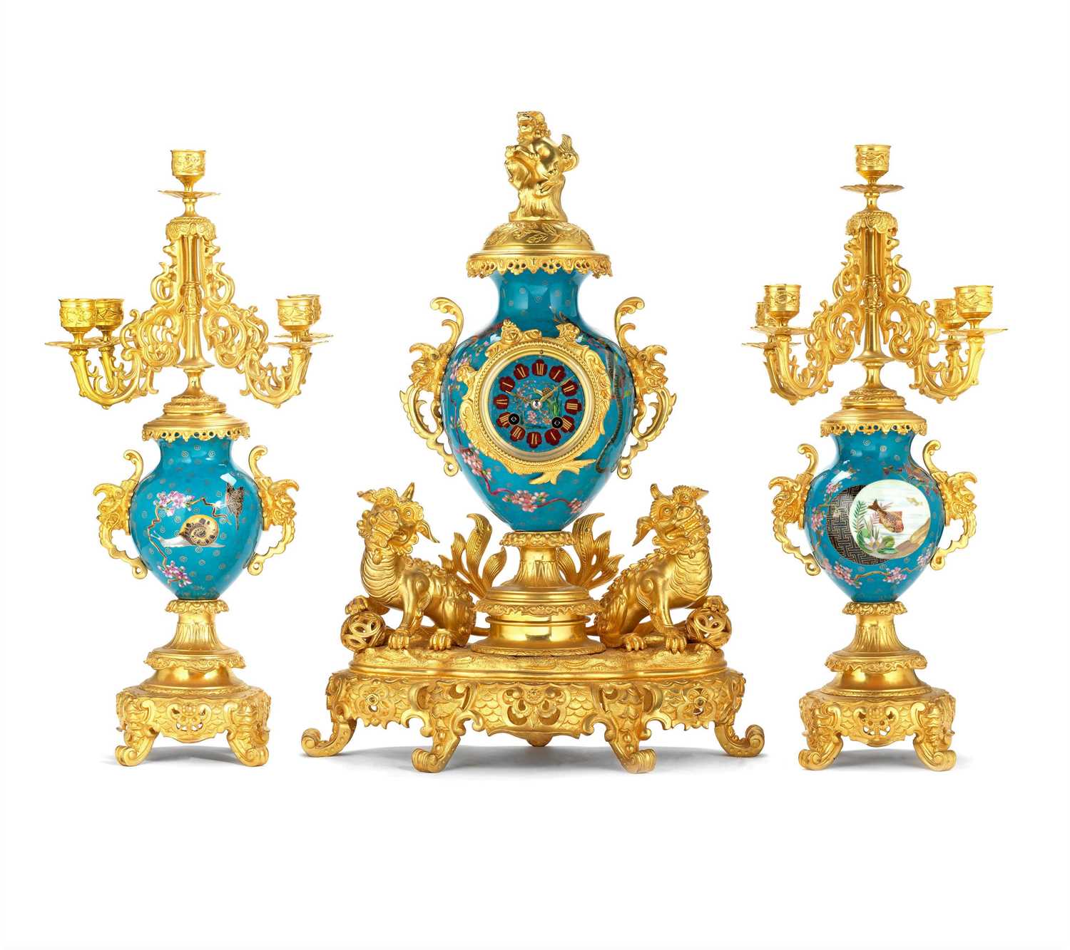 A 19TH CENTURY JAPONISME STYLE GILT BRONZE AND PORCELAIN MOUNTED CLOCK GARNITURE
