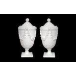 A FINE PAIR OF 19TH CENTURY ITALIAN CARRARA MARBLE URNS