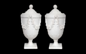 A FINE PAIR OF 19TH CENTURY ITALIAN CARRARA MARBLE URNS