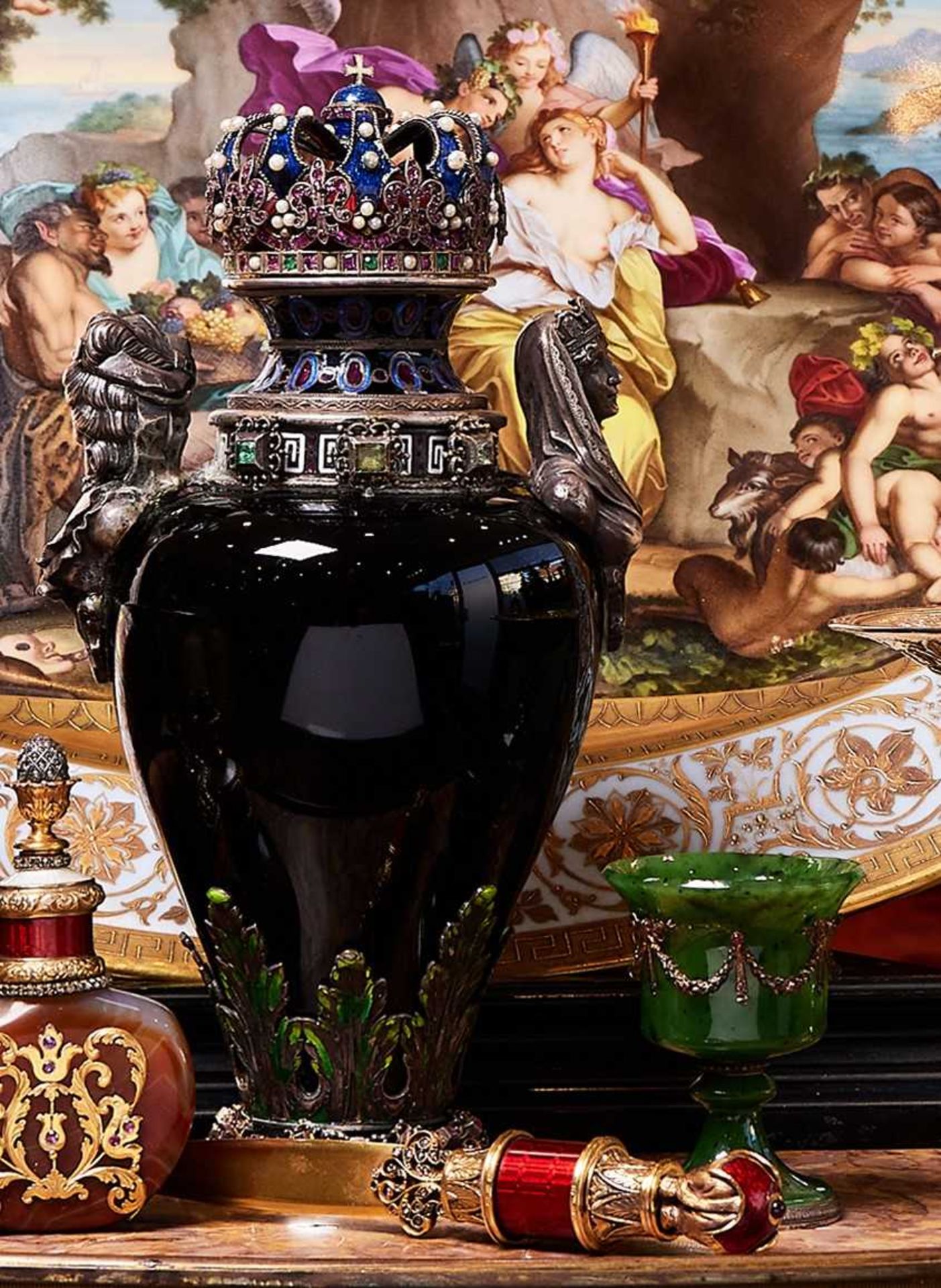 A FINE 19TH CENTURY VIENNESE ENAMEL, SILVER AND JEWELLED URN AND COVER OF ROYAL THEME