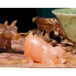 A FABERGE STYLE CARVED HARDSTONE AND GET SET MODEL OF A PIG