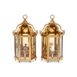 A PAIR OF REGENCY STYLE BRASS HALL LANTERNS