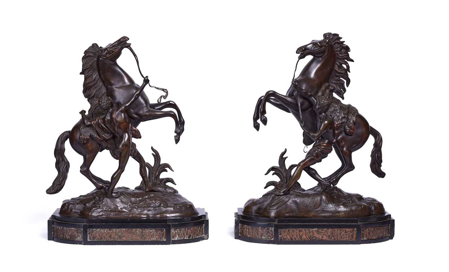A PAIR OF 19TH CENTURY BRONZE MODELS OF THE MARLEY HORSES AFTER COUSTOU (FRENCH, 1677-1746)
