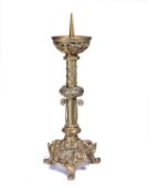 A 19TH CENTURY GILT BRONZE MEDIEVAL STYLE PRICKET CANDLESTICK