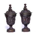 A PAIR OF 19TH CENTURY BRONZE CLASSICAL STYLE LIDDED URNS