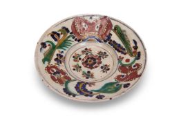 AN 18TH CENTURY TURKISH KUTHYA DISH