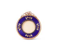 A GOLD, DIAMOND SET AND ENAMEL FABERGE STYLE FRAME