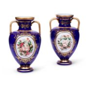 A PAIR OF 19TH CENTURY VIENNESE OPALINE AN GILT DECORATED GLASS VASES