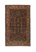 A 1930'S PERSIAN KIRMAN CARPET