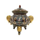 A CHINESE CLOISONNE ENAMEL AND ORMOUL MOUNTED TRIPOD CENSER