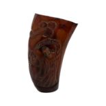 A CHINESE CARVED HORN LIBATION CUP