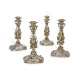 A SET OF SILVER AND SILVER GILT 19TH CENTURY GERMAN CANDLESTICKS, PROBABLY HANAU