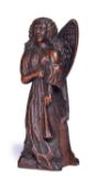 A 19TH CENTURY GOTHIC STYLE OAK CARVING OF AN ANGEL