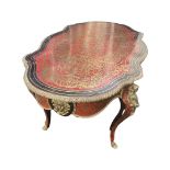 A 19TH CENTURY FRENCH ORMOLU AND TORTOISESHELL MOUNTED BOULLE STYLE TABLE