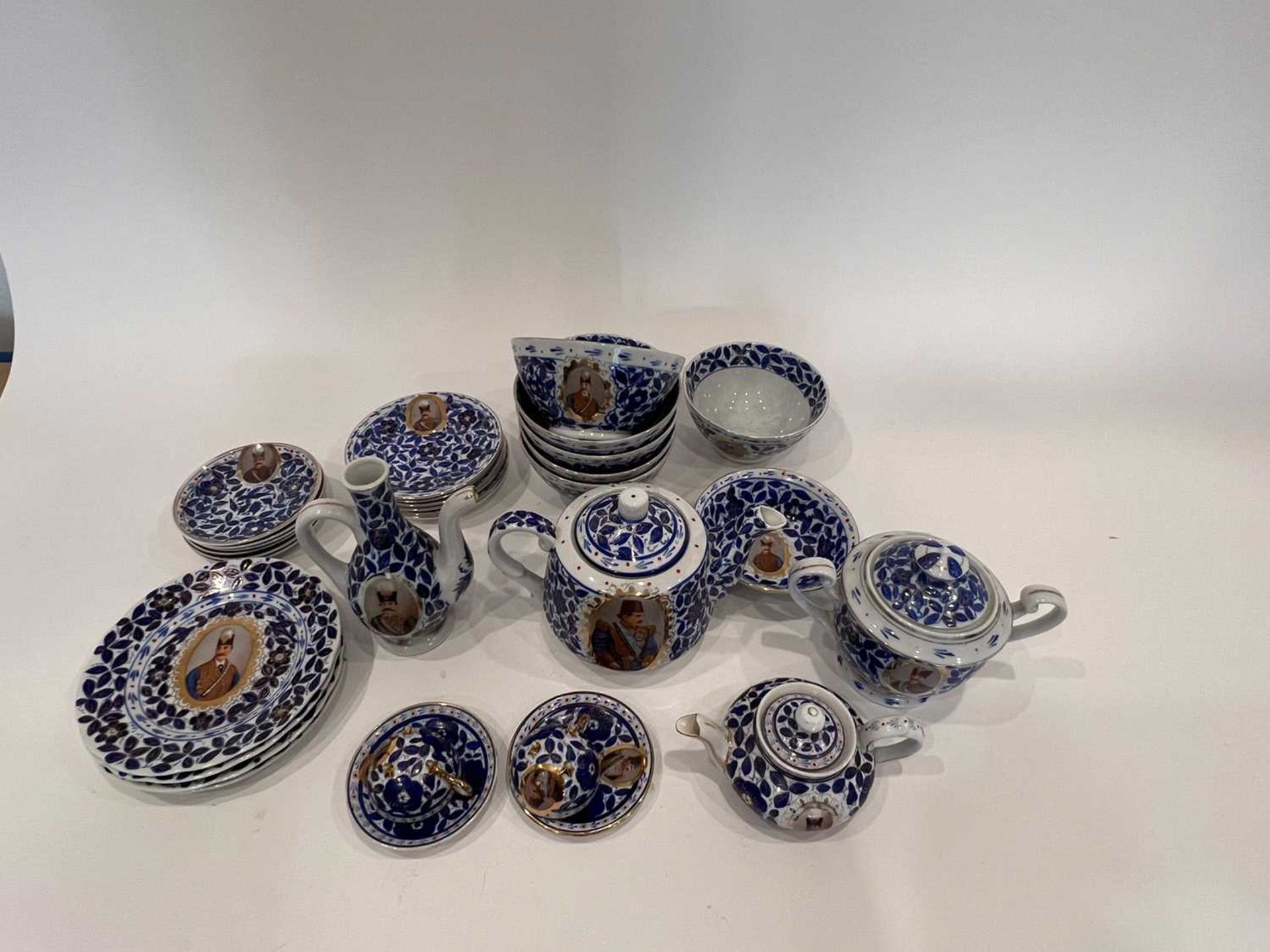 A PORCELAIN TEA AND COFFEE SET MADE FOR THE PERSIAN MARKET - Image 6 of 8