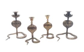 TWO PAIRS OF 19TH / EARLY 20TH CENTURY INDIAN COBRA CANDLESTICKS