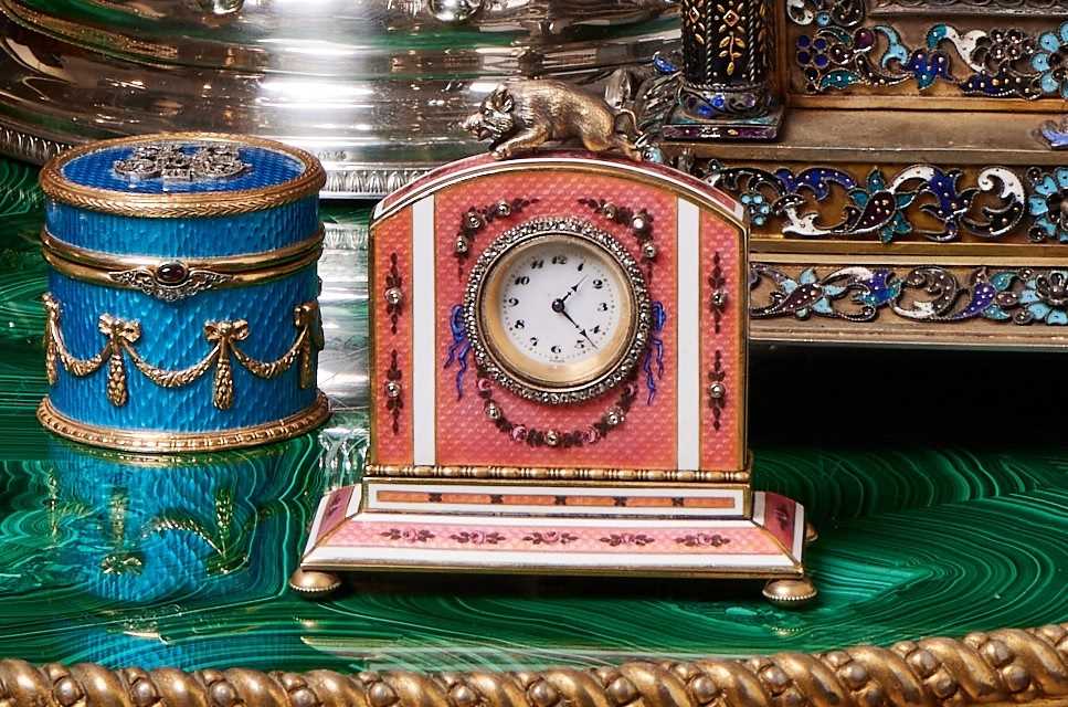 A FABERGE STYLE DIAMOND SET, GUILLOCHE ENAMEL AND SILVER GILT TRAVELLING CLOCK