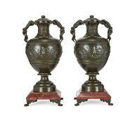 A PAIR OF 19TH CENTURY BRONZE AND MARBLE URNS