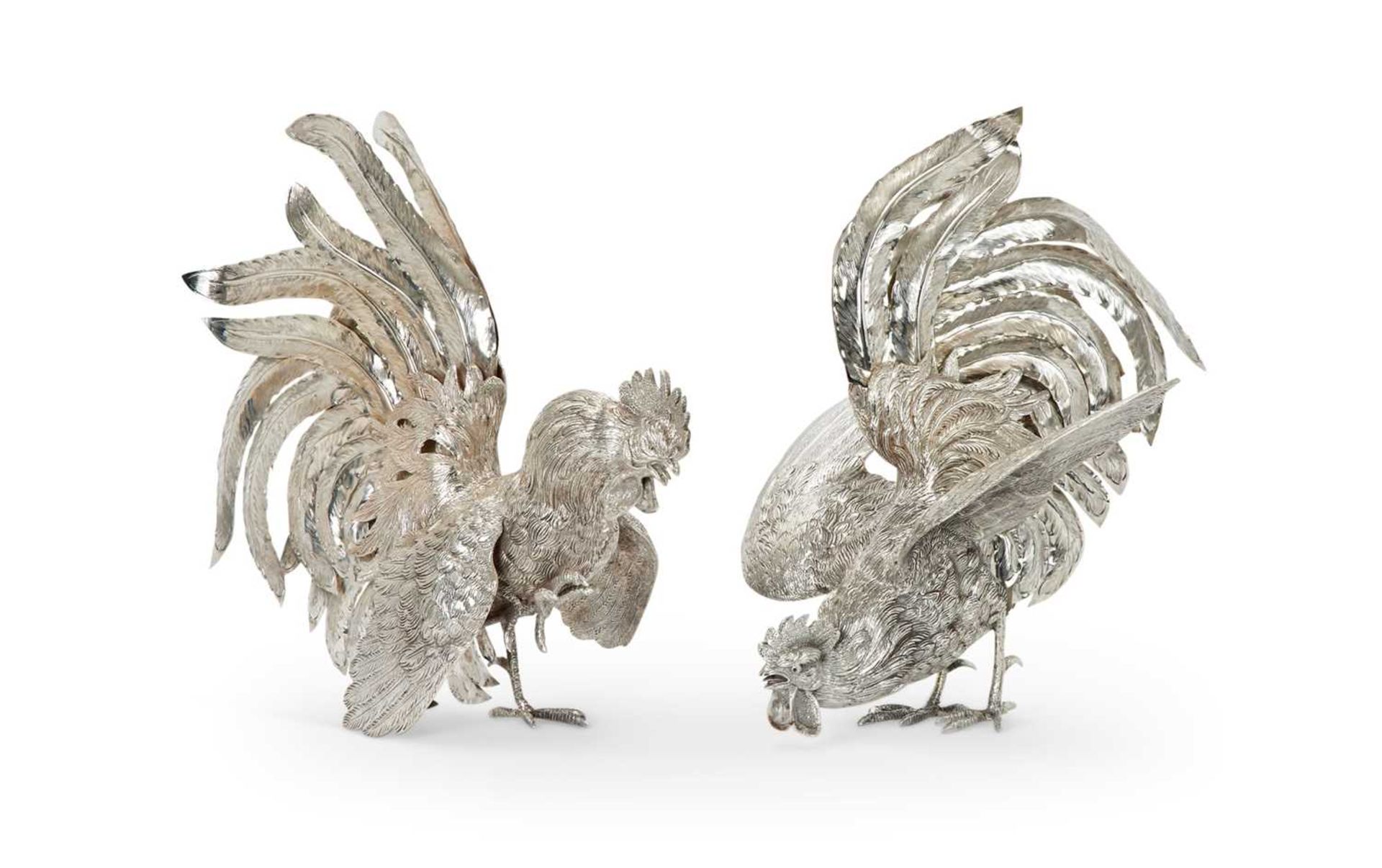 A LARGE PAIR OF STERLING SILVER FIGHTING COCKEREL TABLE ORNAMENTS BY CAMUSSO, PERU