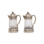 MAISON ODIOT: A FINE PAIR OF 19TH CENTURY SILVER AND CUT GLASS CLARET JUGS CIRCA 1870