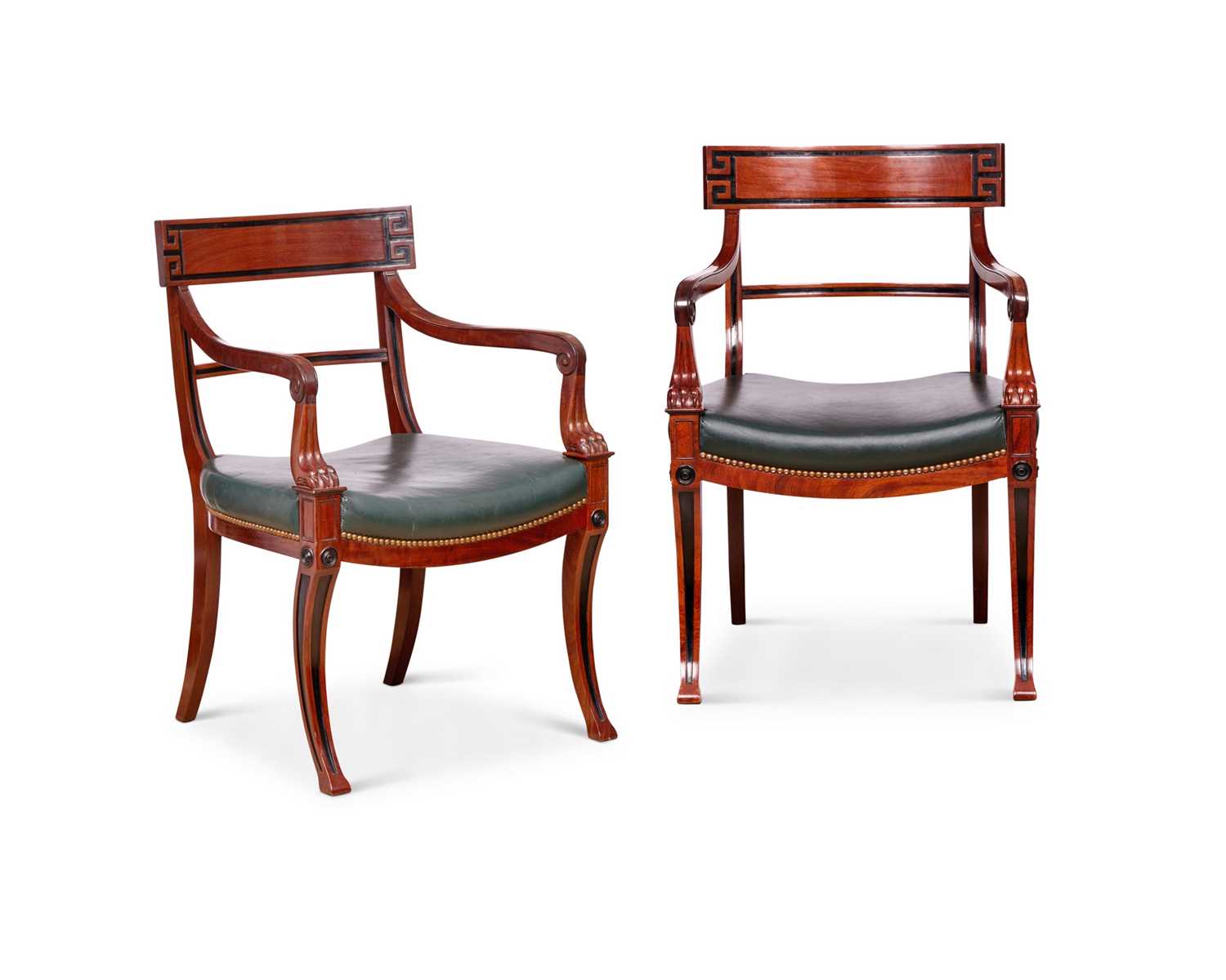 A PAIR OF 19TH CENTURY NORTH EUROPEAN MAHOGANY AND LEATHER ARMCHAIRS