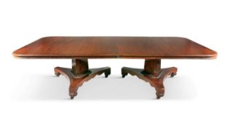 AN EARLY 19TH CENTURY MAHOGANY TWIN PILLAR DINING TABLE CIRCA 1820