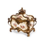 KPM: A RARE 19TH CENTURY BERLIN PORCELAIN CASKET MODELLED AS A ROYAL CARRIAGE, CIRCA 1880