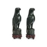 A PAIR OF CHINESE CARVED SPINACH JADE MODELS OF BIRDS