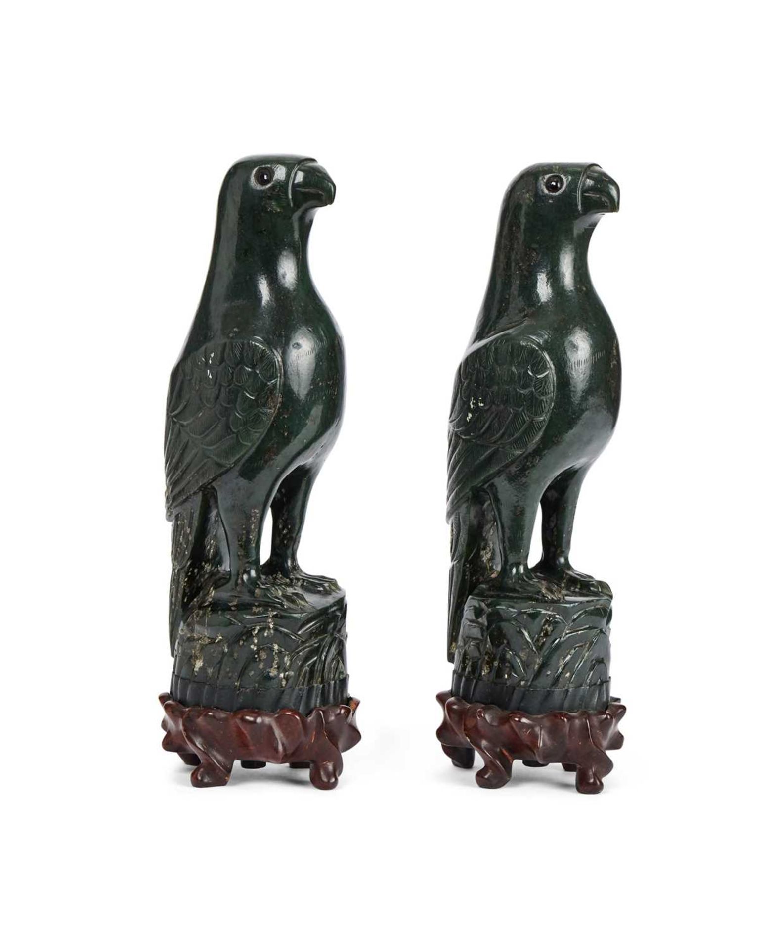 A PAIR OF CHINESE CARVED SPINACH JADE MODELS OF BIRDS